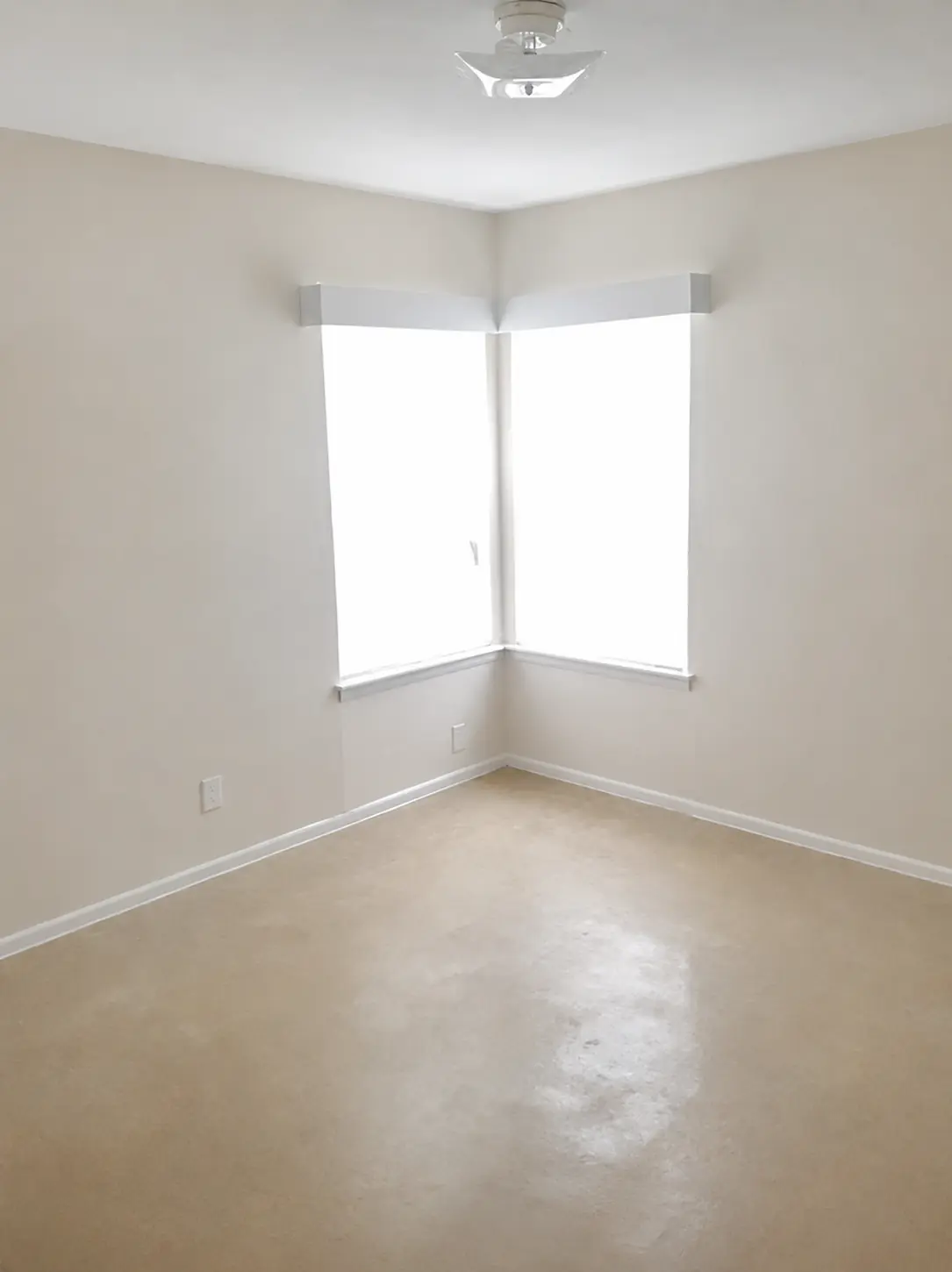 Bedroom with corner windows